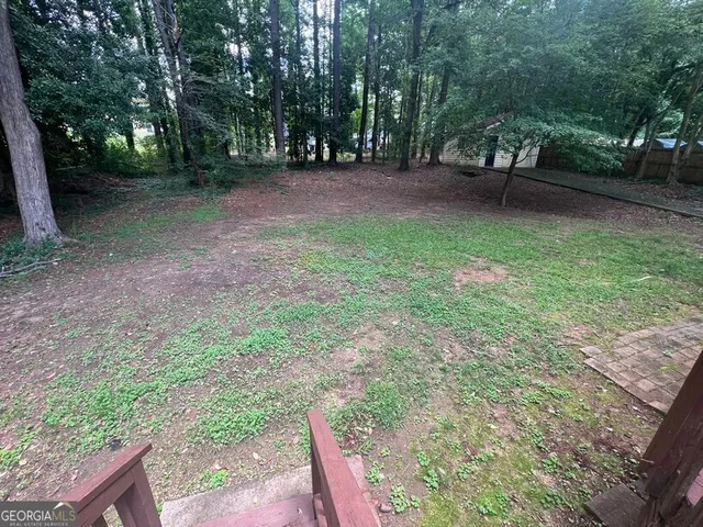 a view of a yard with a trees