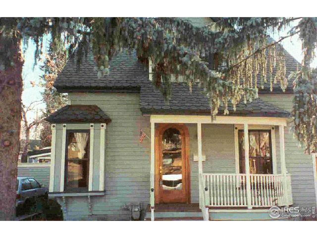 a front view of a house with a porch