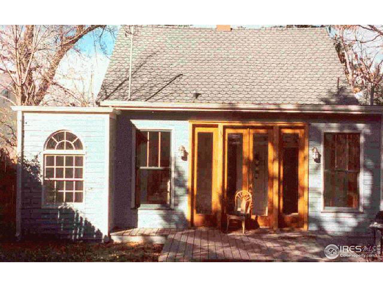 826 Maxwell Avenue Boulder, CO 80304 - Photo 3 of 6 a view of a house with a windows and wooden fence