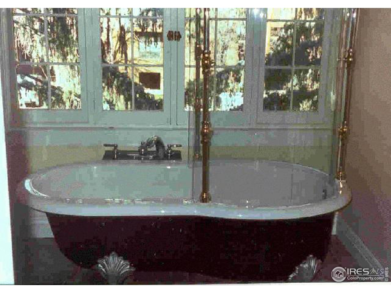 826 Maxwell Avenue Boulder, CO 80304 - Photo 5 of 6 a bathroom with a sink and mirror