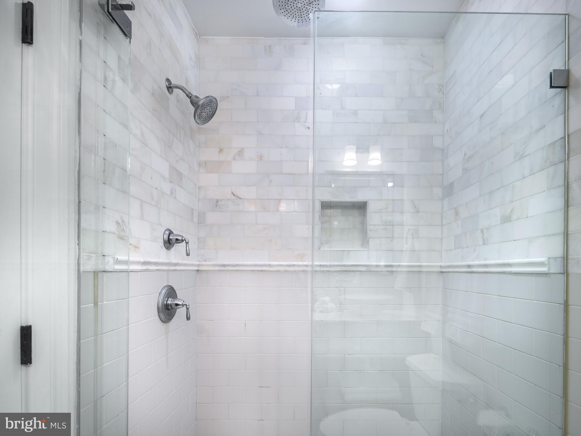 1717 Euclid Street Northwest, Unit 1 Washington, DC 20009 - Photo 11 of 23 a bathroom with a shower