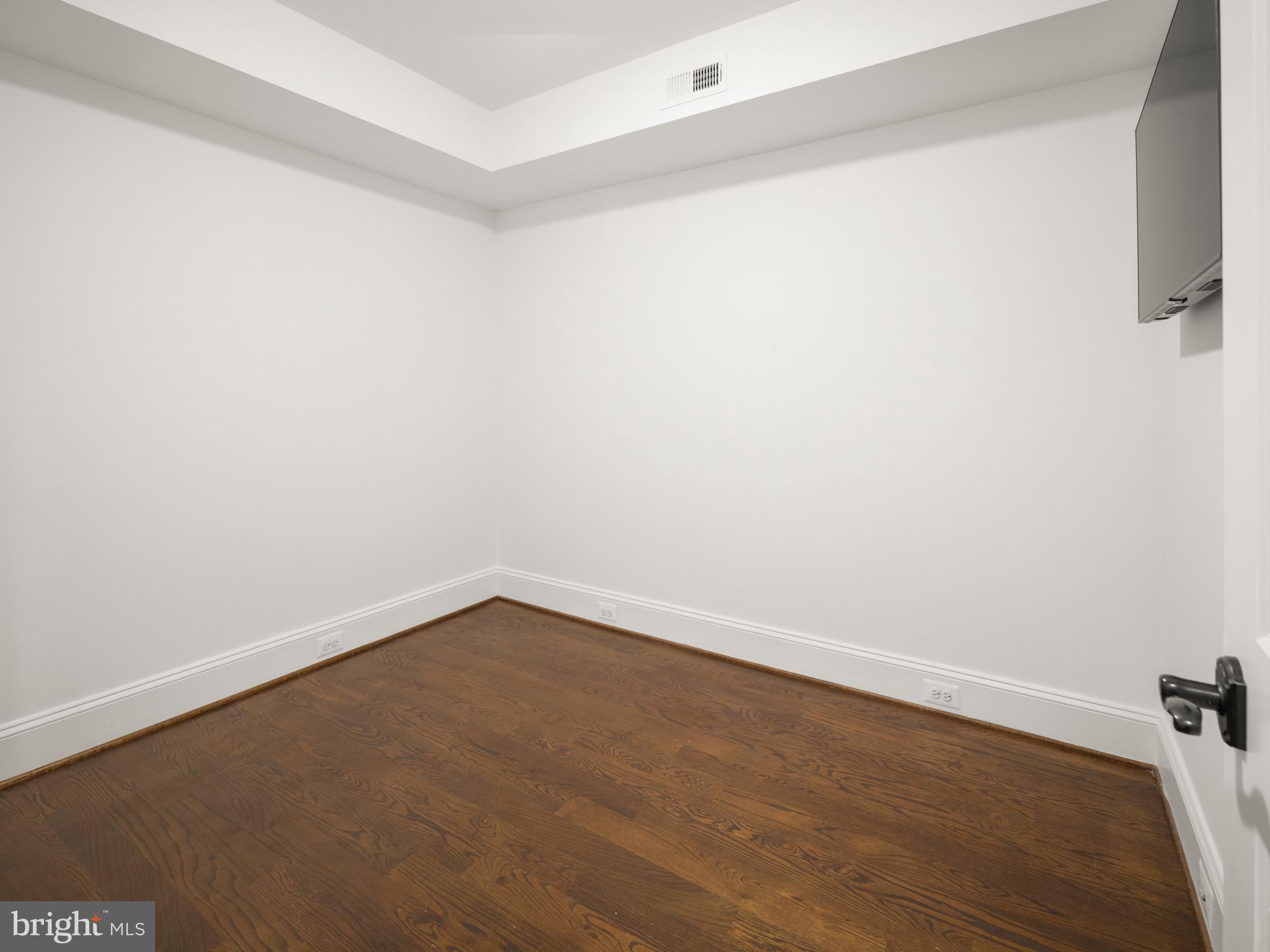 1717 Euclid Street Northwest, Unit 1 Washington, DC 20009 - Photo 15 of 23 a view of an empty room