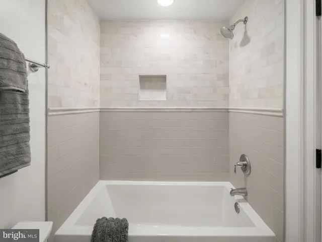 a bathroom with a bathtub