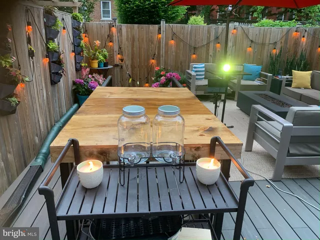 a view of a deck with furniture