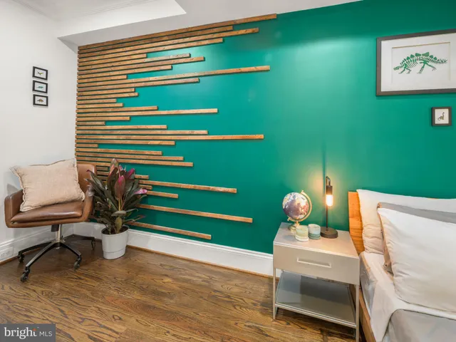 a view of a room with a table and a chair