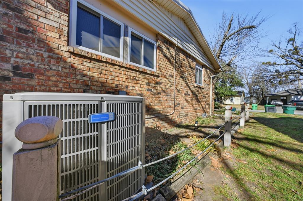 610 Walter Road Gainesville, TX 76240 - Photo 22 of 33 a view of a house with backyard and wooden fence