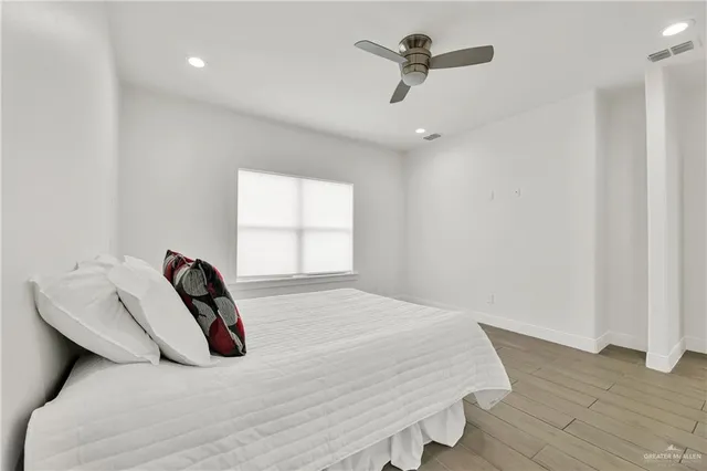 a bathroom with a double vanity sink and mirror