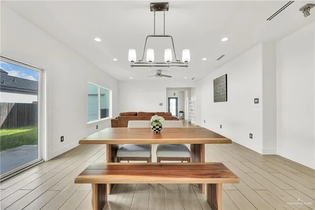 a view of empty room with ceiling fan