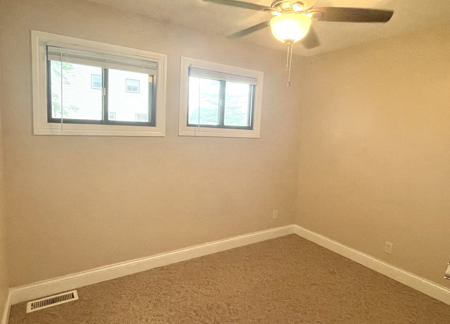 1415 Plain Street Peru, IL 61354 - Photo 8 of 17 an empty room with a window