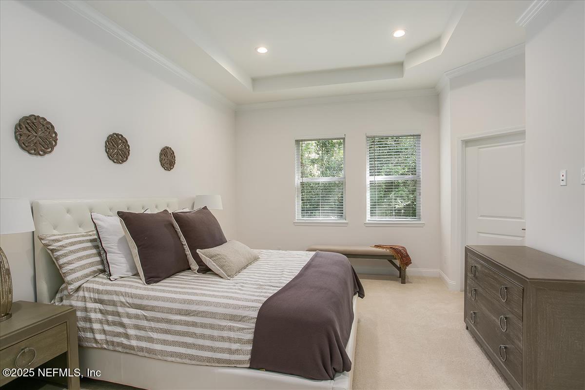 109 Rimini Court Jacksonville, FL 32225 - Photo 13 of 27 a bedroom with a large bed and a window