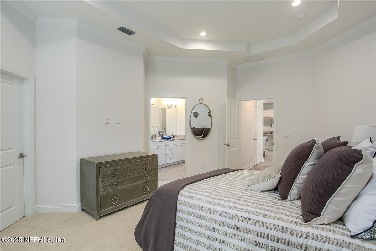 109 Rimini Court Jacksonville, FL 32225 - Photo 14 of 27 a bedroom with a bed and wooden floor