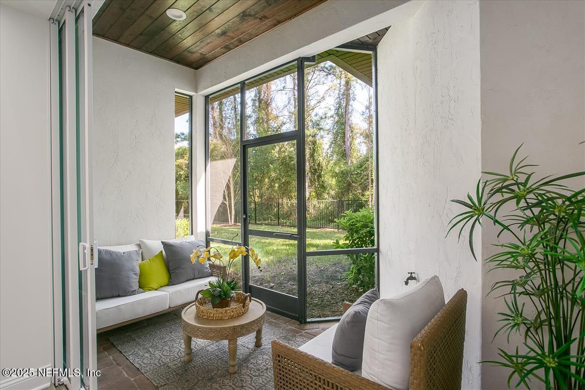 109 Rimini Court Jacksonville, FL 32225 - Photo 21 of 27 a living room with furniture and a potted plant