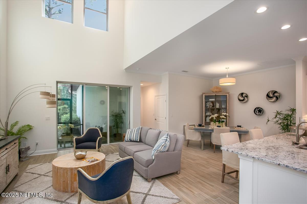 109 Rimini Court Jacksonville, FL 32225 - Photo 4 of 27 a living room with furniture and a mirror