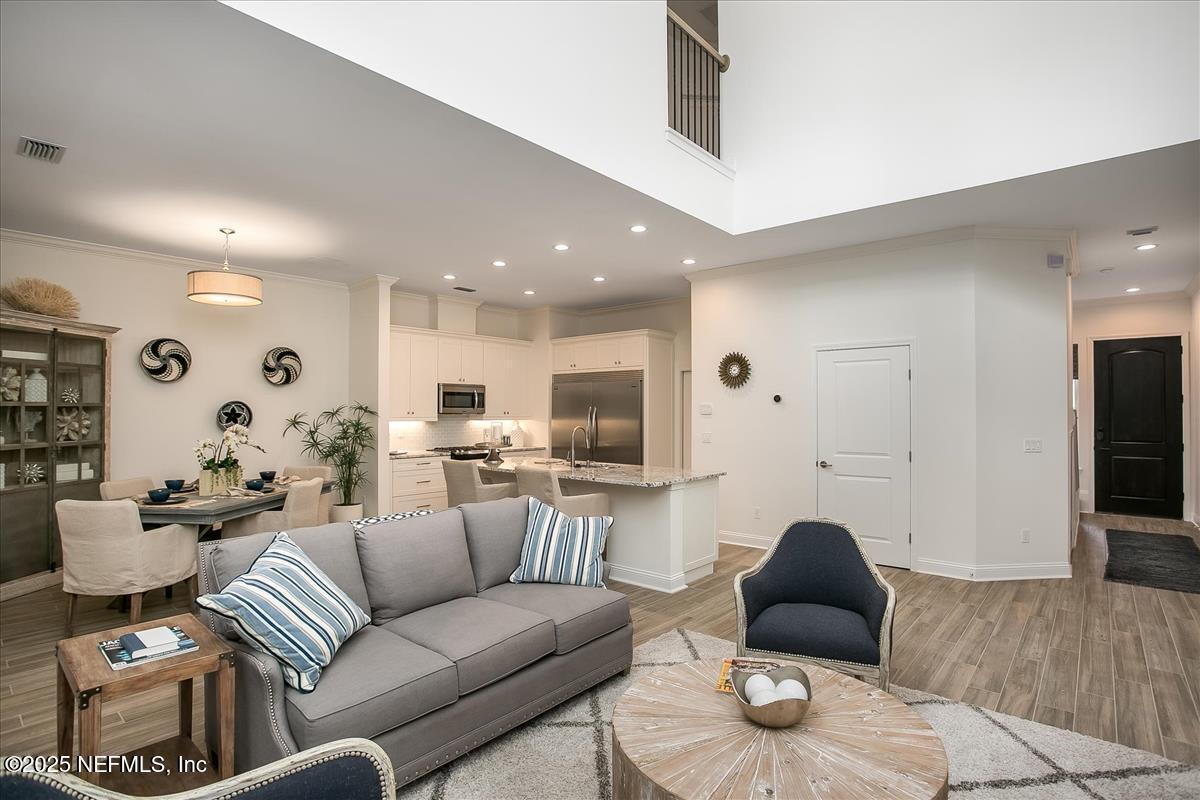 109 Rimini Court Jacksonville, FL 32225 - Photo 6 of 27 a living room with furniture kitchen view and a window