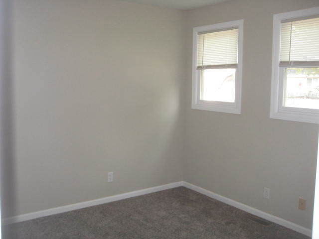 1111 North Kankakee Street Wilmington, IL 60481 - Photo 3 of 8 an empty room with windows