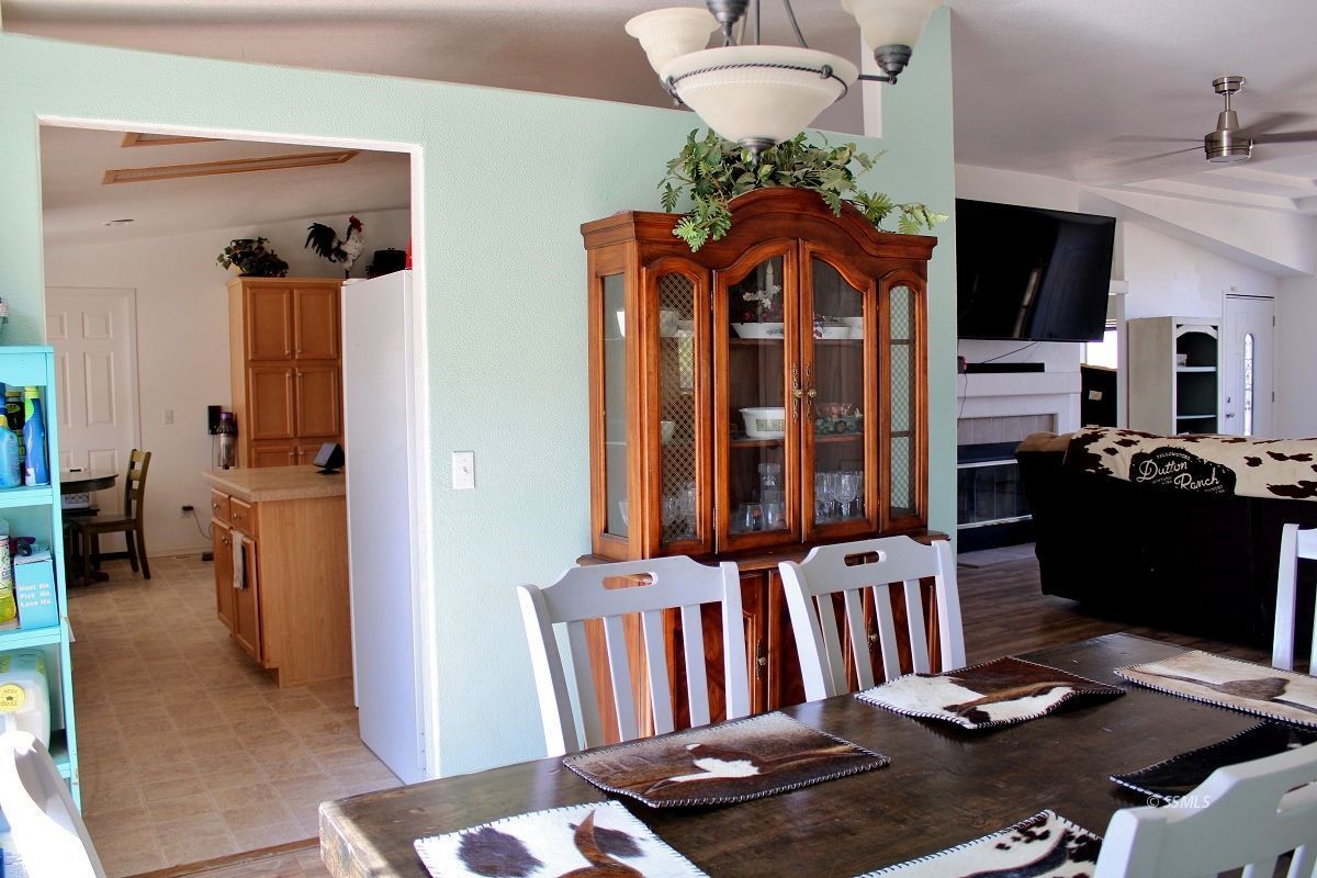 10158 Hillview Acres Road Weldon, CA 93283 - Photo 15 of 45 a living room with furniture and flat screen tv