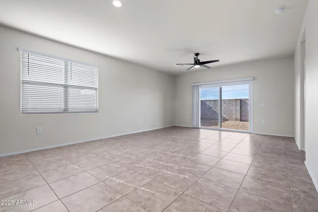 a view of a kitchen with a sink and a window