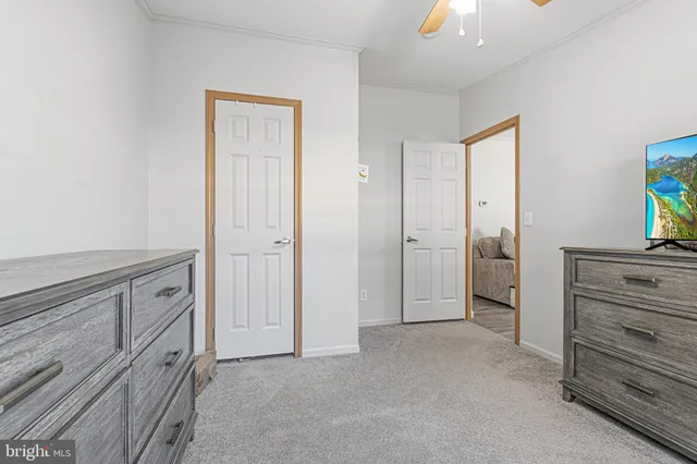 a view of a hallway with closet