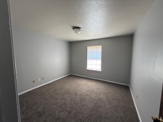 4805 Lavaca Drive, Unit 1 Corpus Christi, TX 78411 - Photo 5 of 7 an empty room with a window