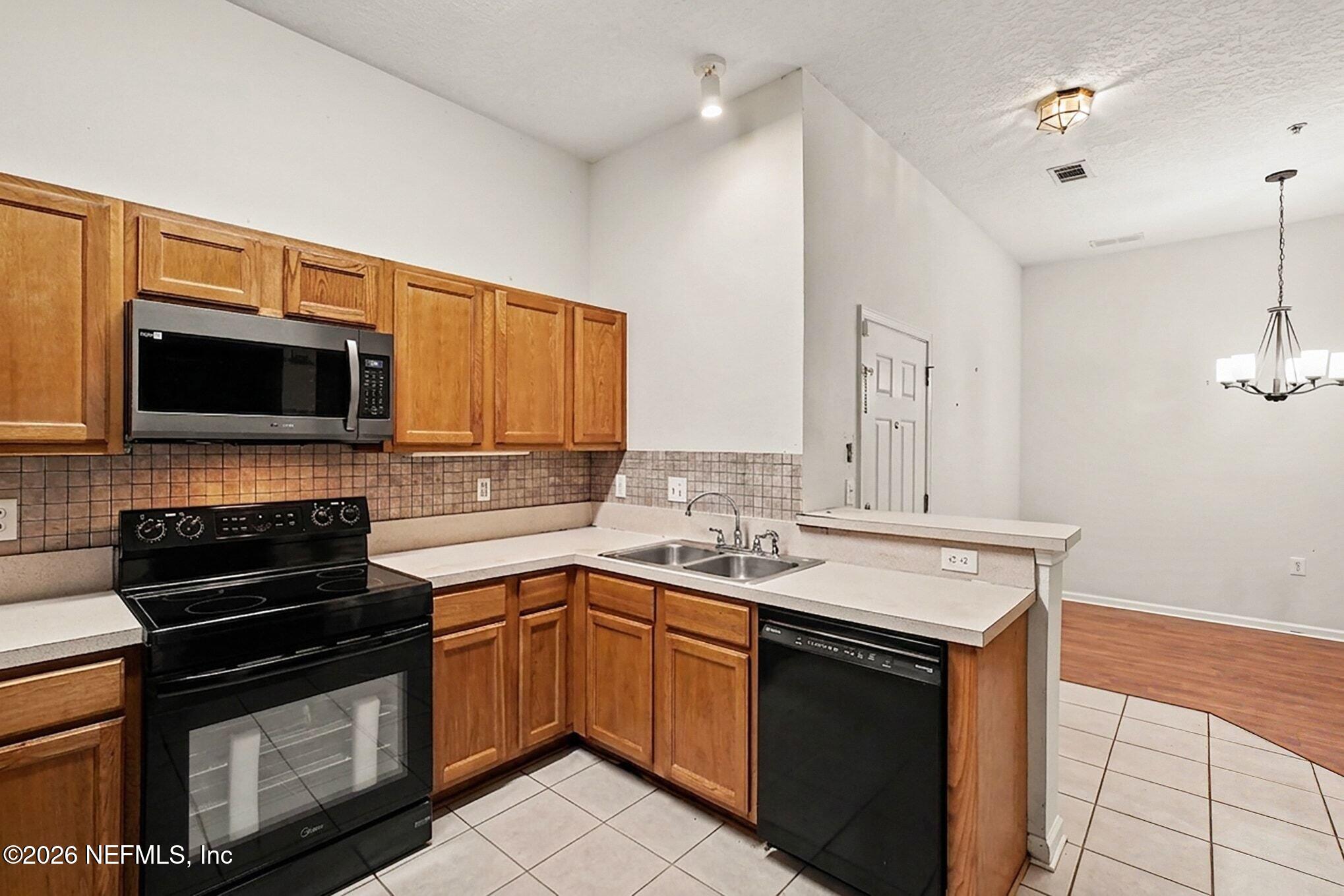7920 Merrill Road, Unit 1808 Jacksonville, FL 32277 - Photo 10 of 23 010_file_3740