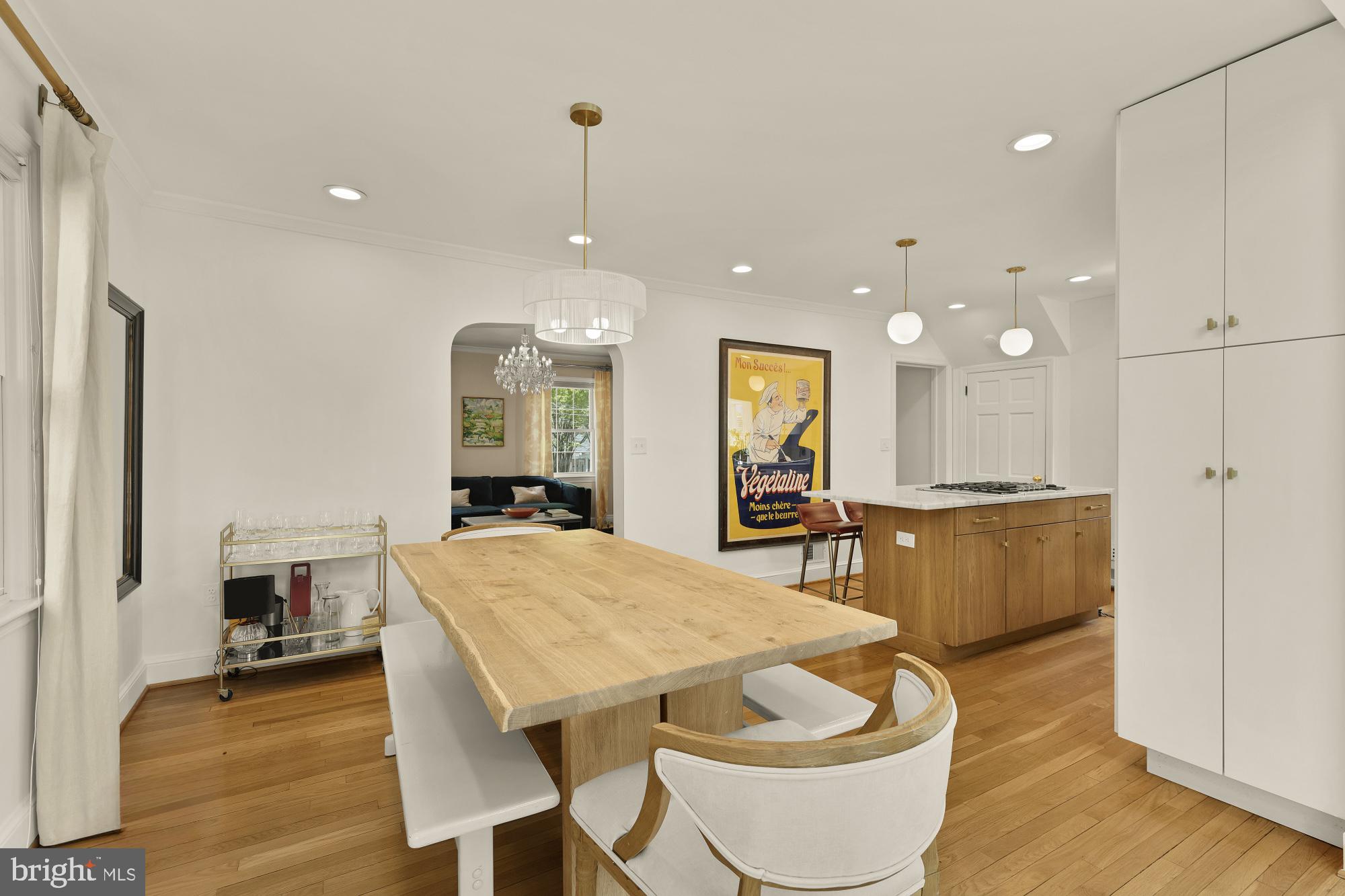 7208 Delfield Street Chevy Chase, MD 20815 - Photo 21 of 50 a large kitchen with a table and chairs