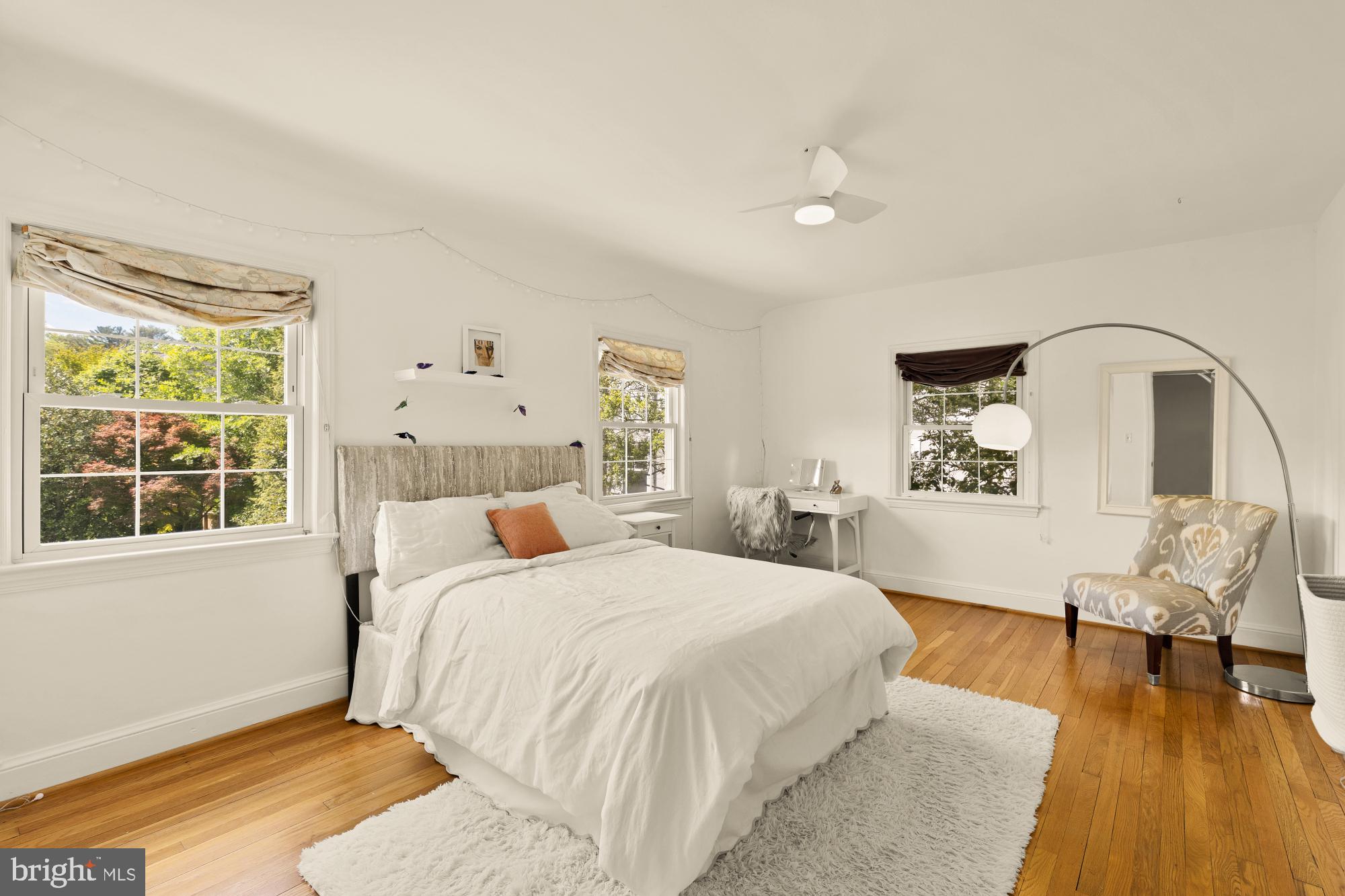 7208 Delfield Street Chevy Chase, MD 20815 - Photo 27 of 50 a bedroom with a large bed and a window