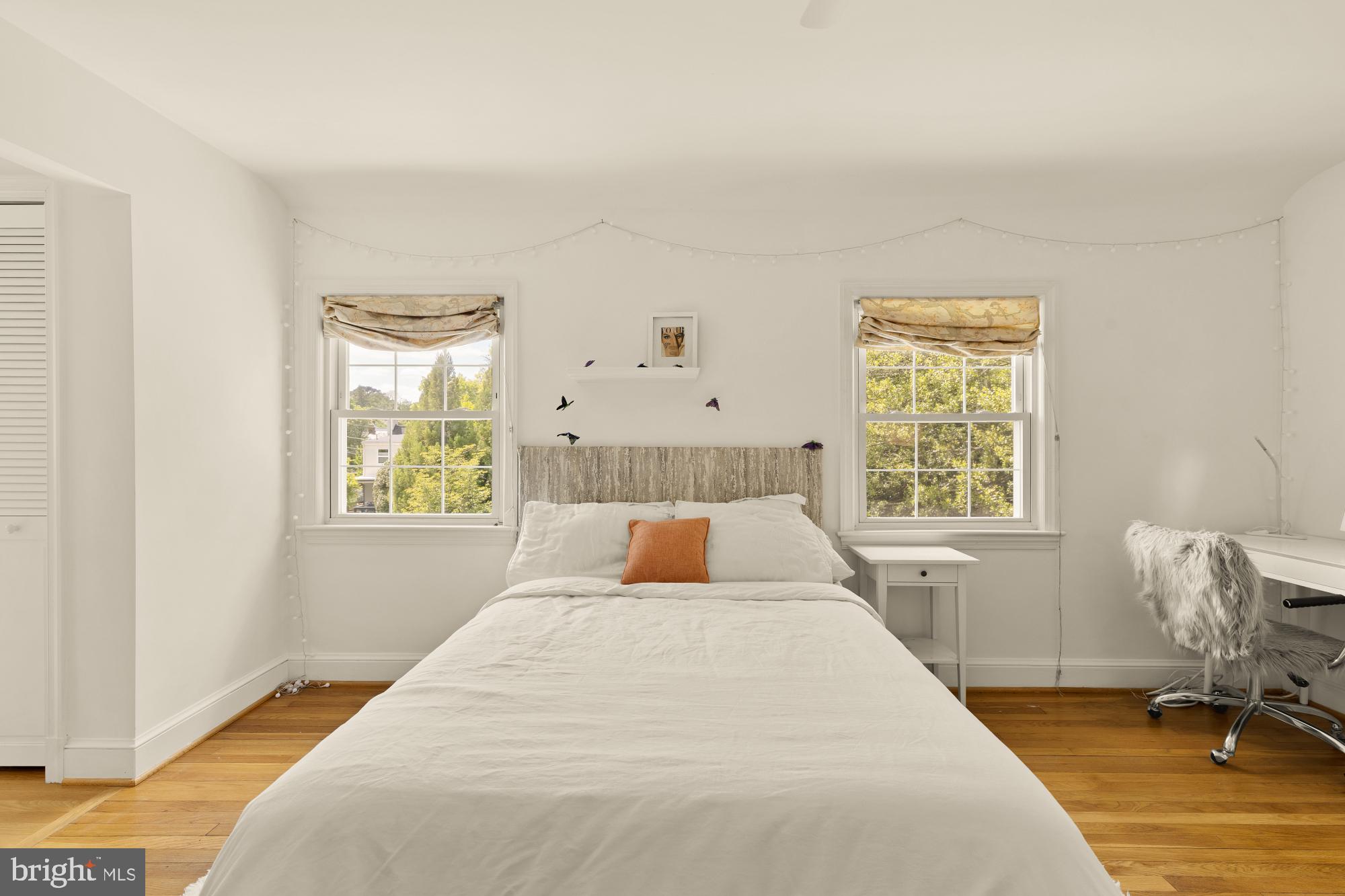 7208 Delfield Street Chevy Chase, MD 20815 - Photo 28 of 50 a bedroom with a bed and a window