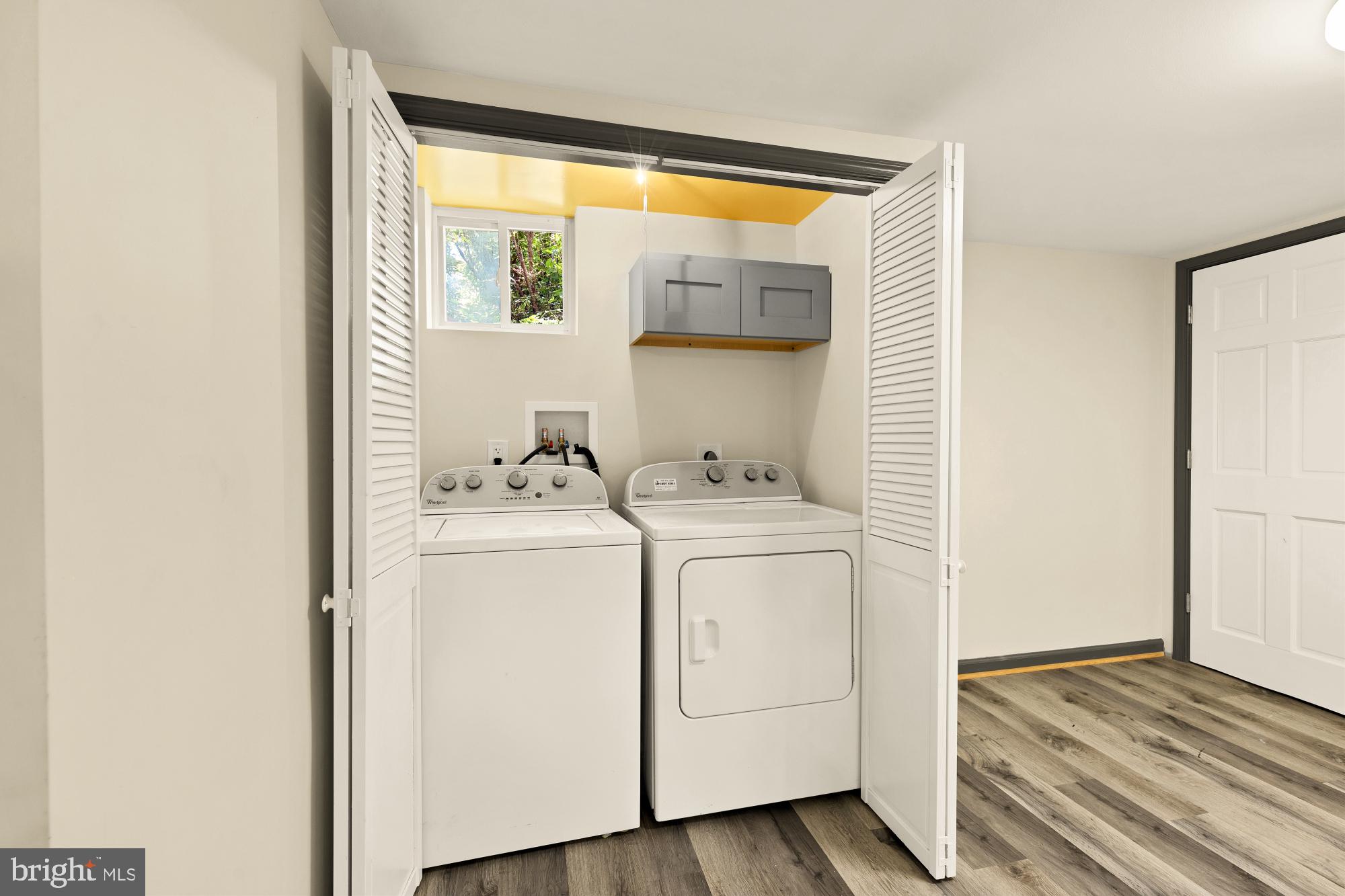 7208 Delfield Street Chevy Chase, MD 20815 - Photo 43 of 50 a view of utility room with washer and dryer