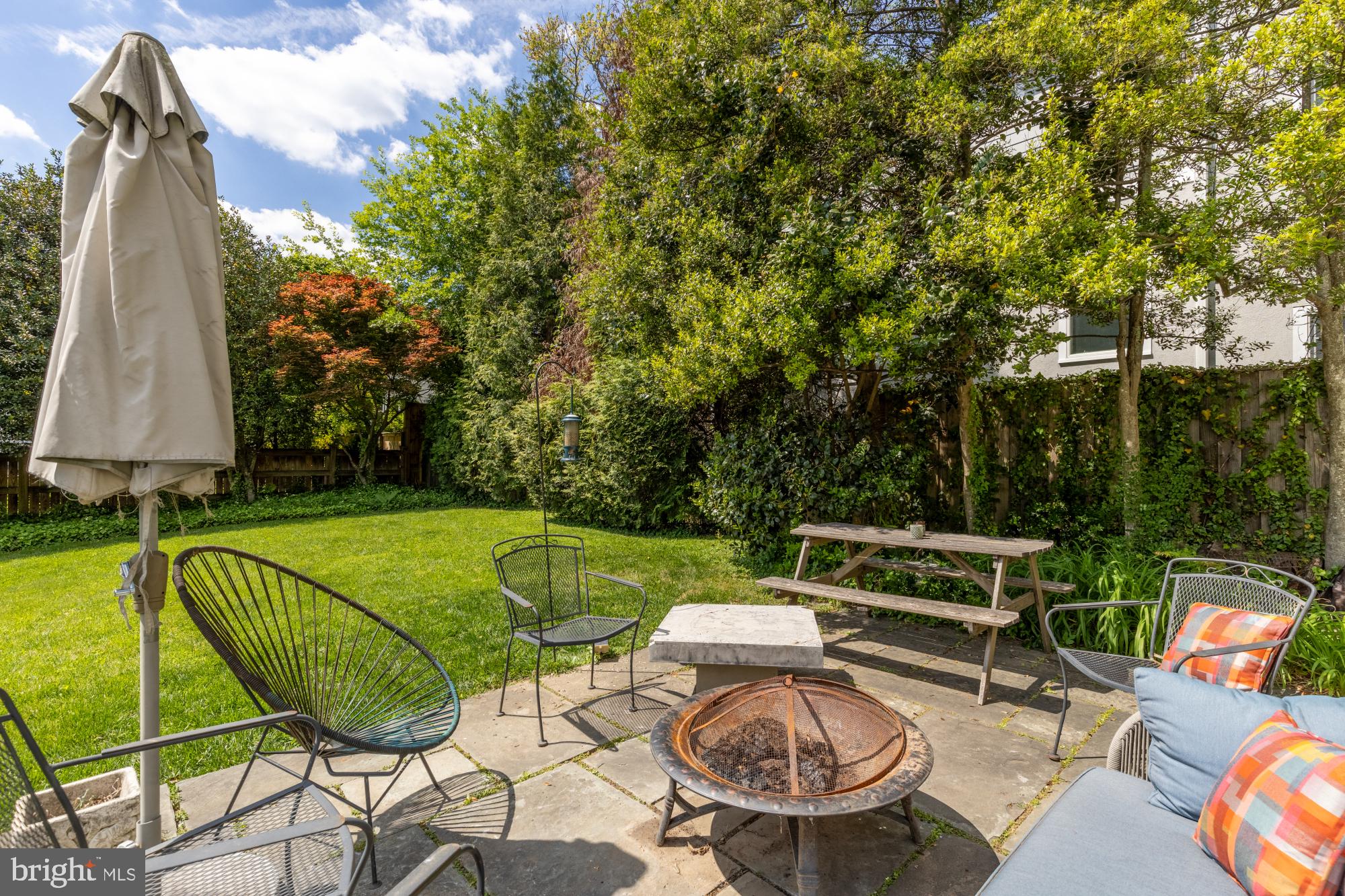 7208 Delfield Street Chevy Chase, MD 20815 - Photo 44 of 50 a view of a swimming pool with a patio and a yard