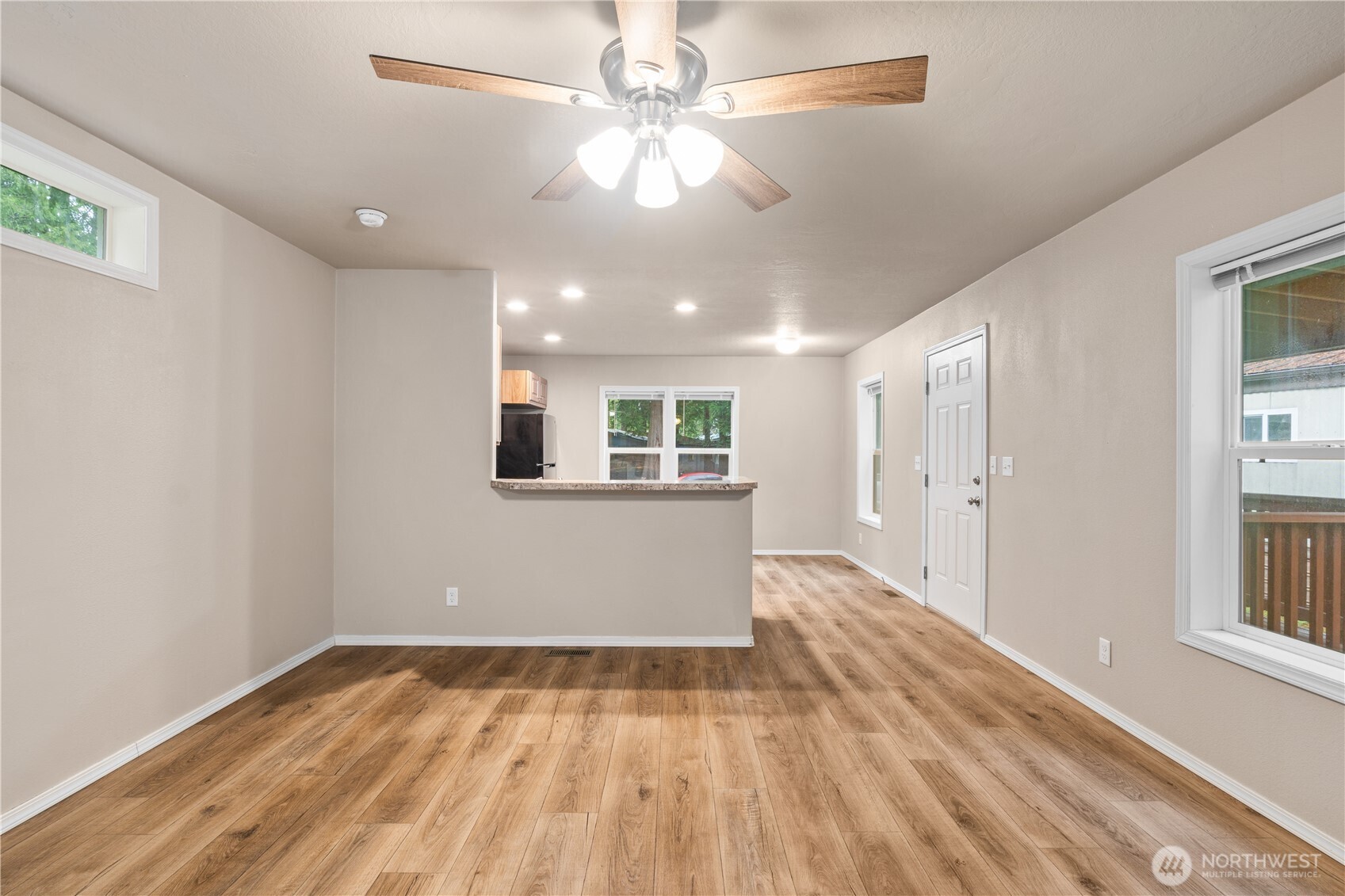 3557 Cedarville Road, Unit 25 Bellingham, WA 98226 - Photo 11 of 29 wooden floor in an empty room with a window