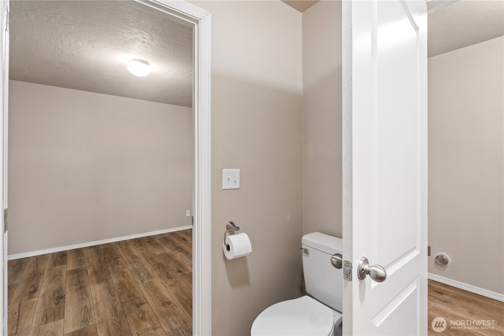 3557 Cedarville Road, Unit 25 Bellingham, WA 98226 - Photo 21 of 29 a white toilet sitting next to a shower