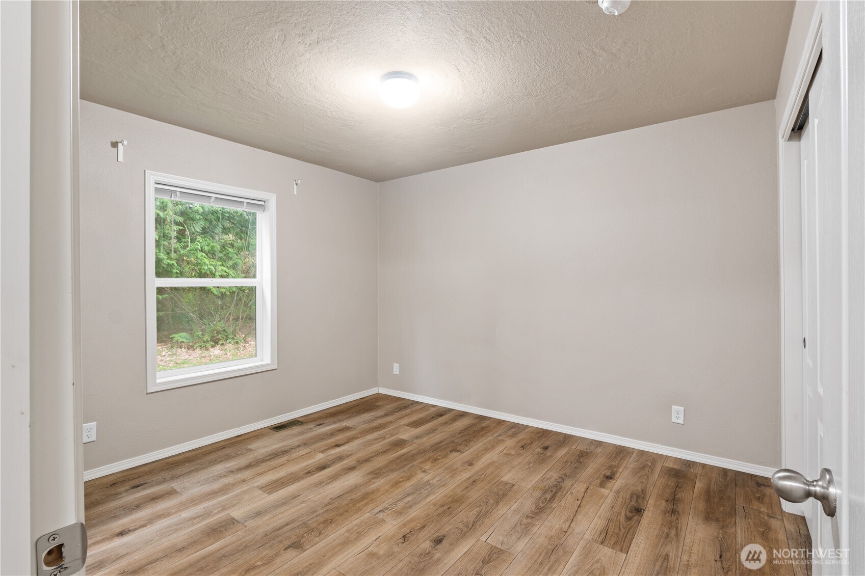 3557 Cedarville Road, Unit 25 Bellingham, WA 98226 - Photo 24 of 29 an empty room with a window