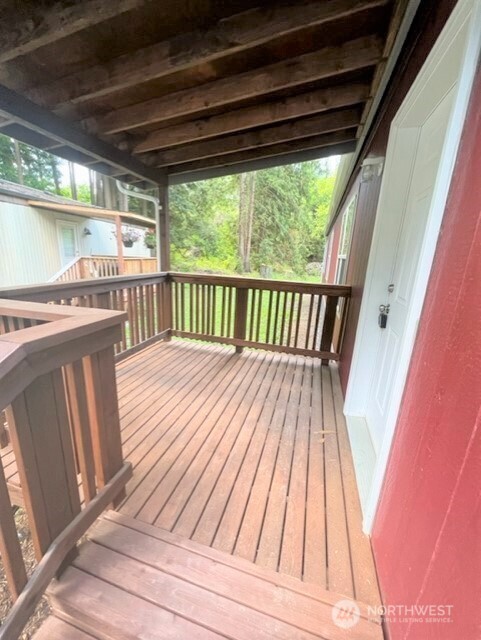 3557 Cedarville Road, Unit 25 Bellingham, WA 98226 - Photo 27 of 29 a view of balcony with wooden floor