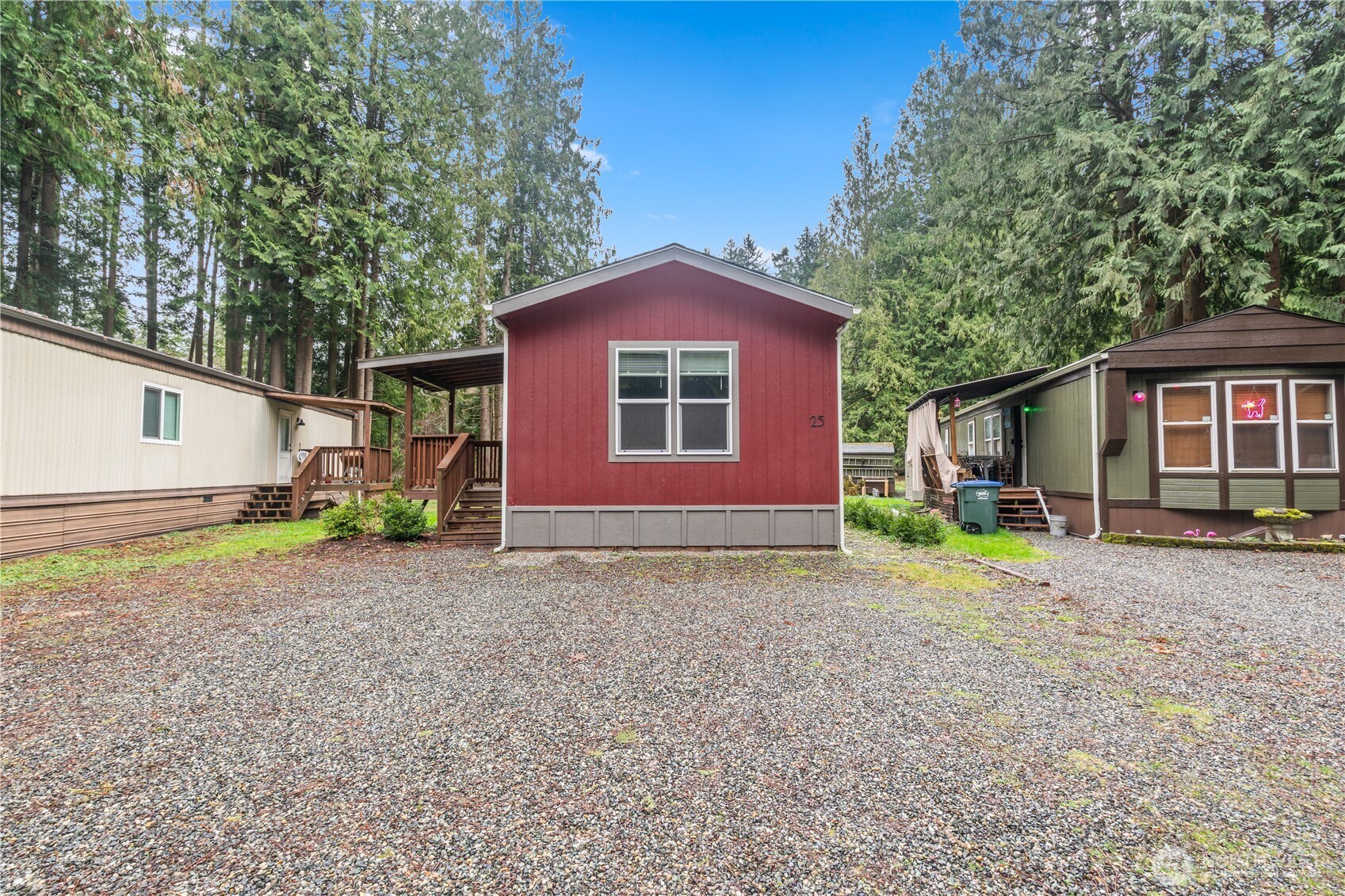3557 Cedarville Road, Unit 25 Bellingham, WA 98226 - Photo 29 of 29 a front view of a house with a yard and garage