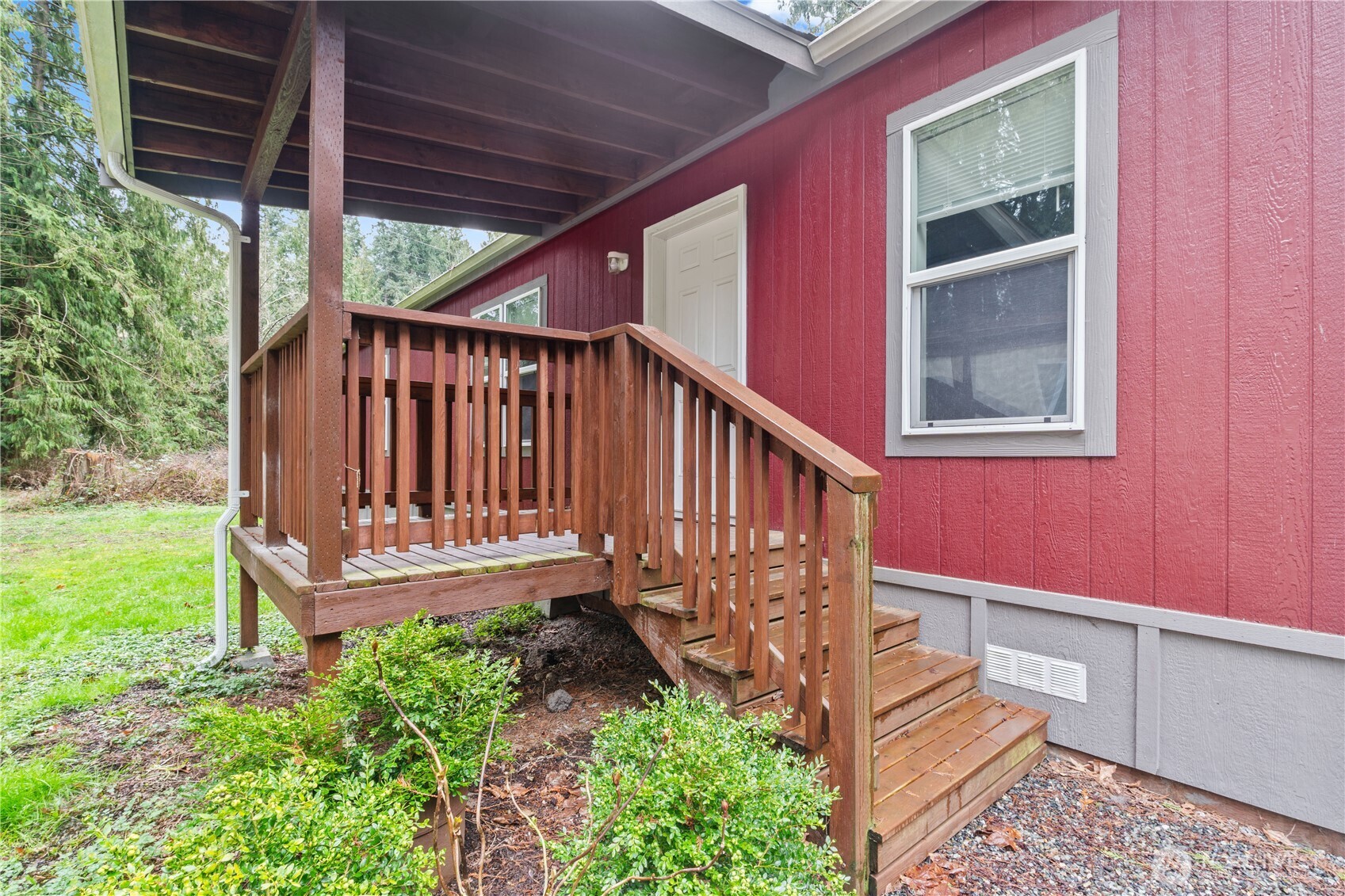 3557 Cedarville Road, Unit 25 Bellingham, WA 98226 - Photo 3 of 29 a view of a backyard with a deck