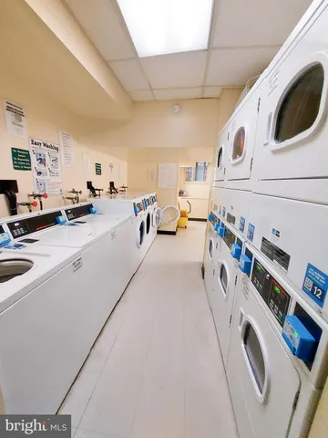 a view of a kitchen with storage and utility