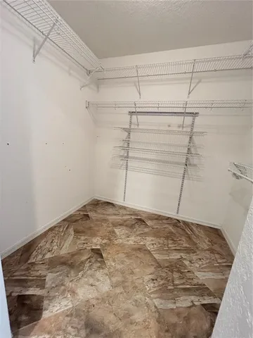 a view of a room with racks on the wall