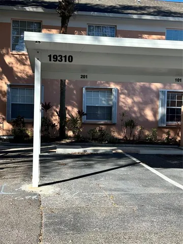 a view of fireplace and living room