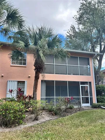 front view of a house with a garden