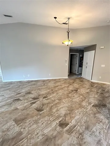 a view of a room with an entryway