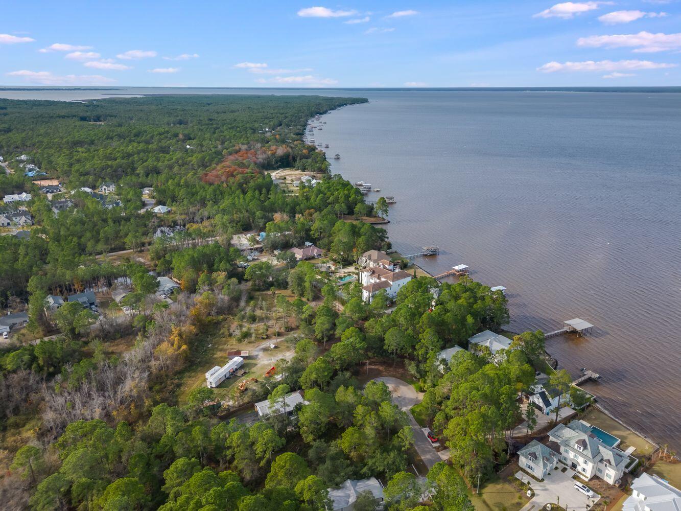 Lot 15 Carolyn Lane Santa Rosa Beach, FL 32459 - Photo 12 of 19 a view of a garden from a yard