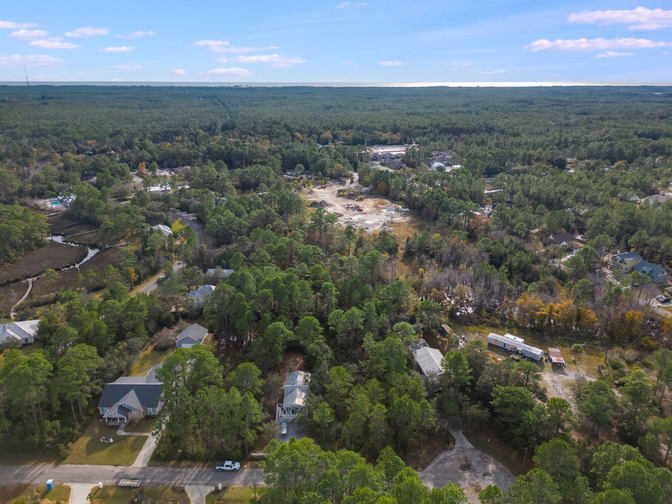 Lot 15 Carolyn Lane Santa Rosa Beach, FL 32459 - Photo 14 of 19 an aerial view of beach and residential houses with outdoor space