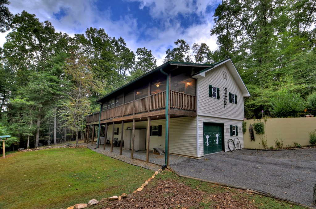 97 Mill Creek Acres Blue Ridge, GA 30513 - Photo 2 of 33 a view of a house with a yard