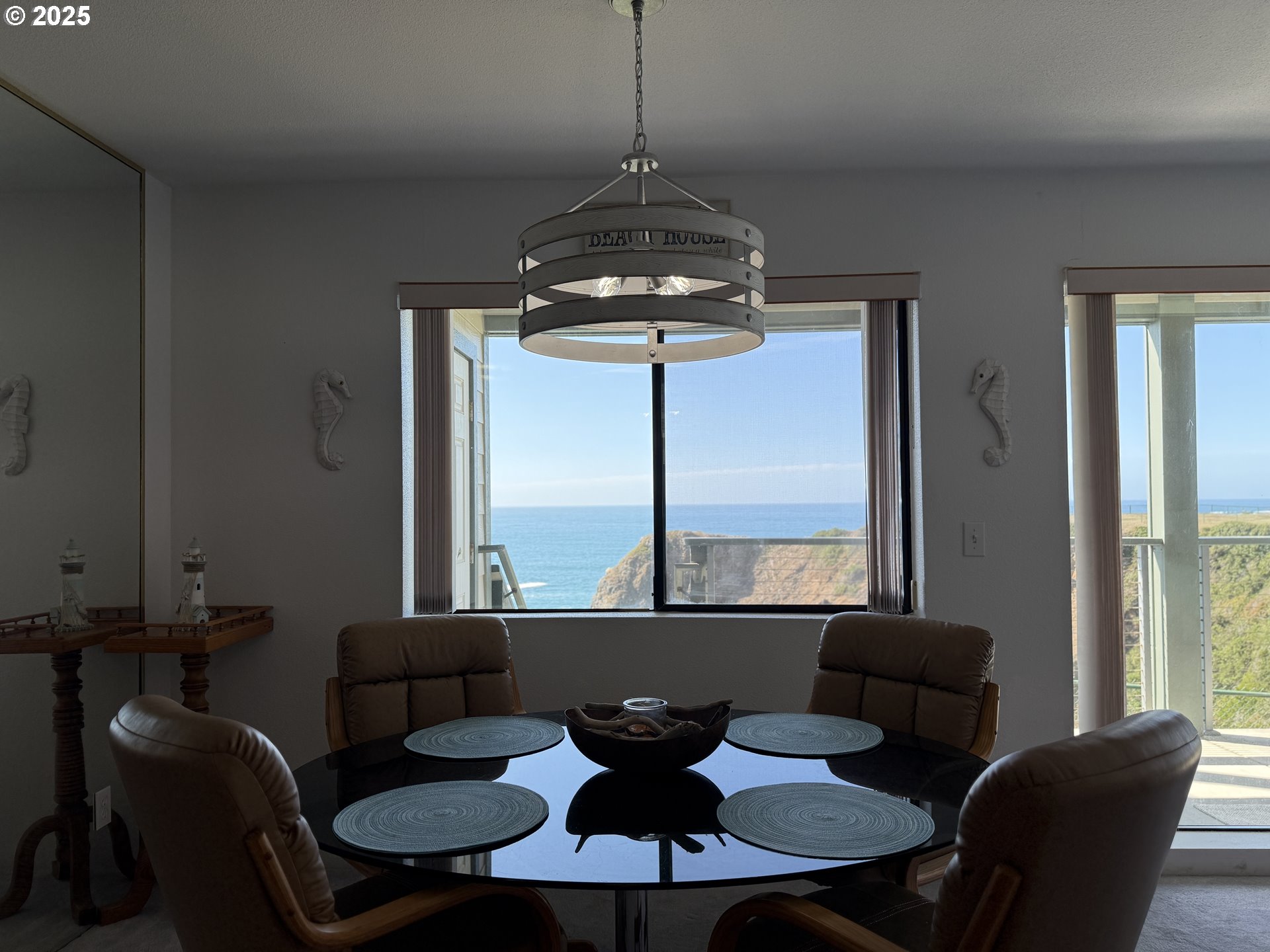 1305 Moore Street, Unit 402 Brookings, OR 97415 - Photo 14 of 28 a dining room with furniture and window