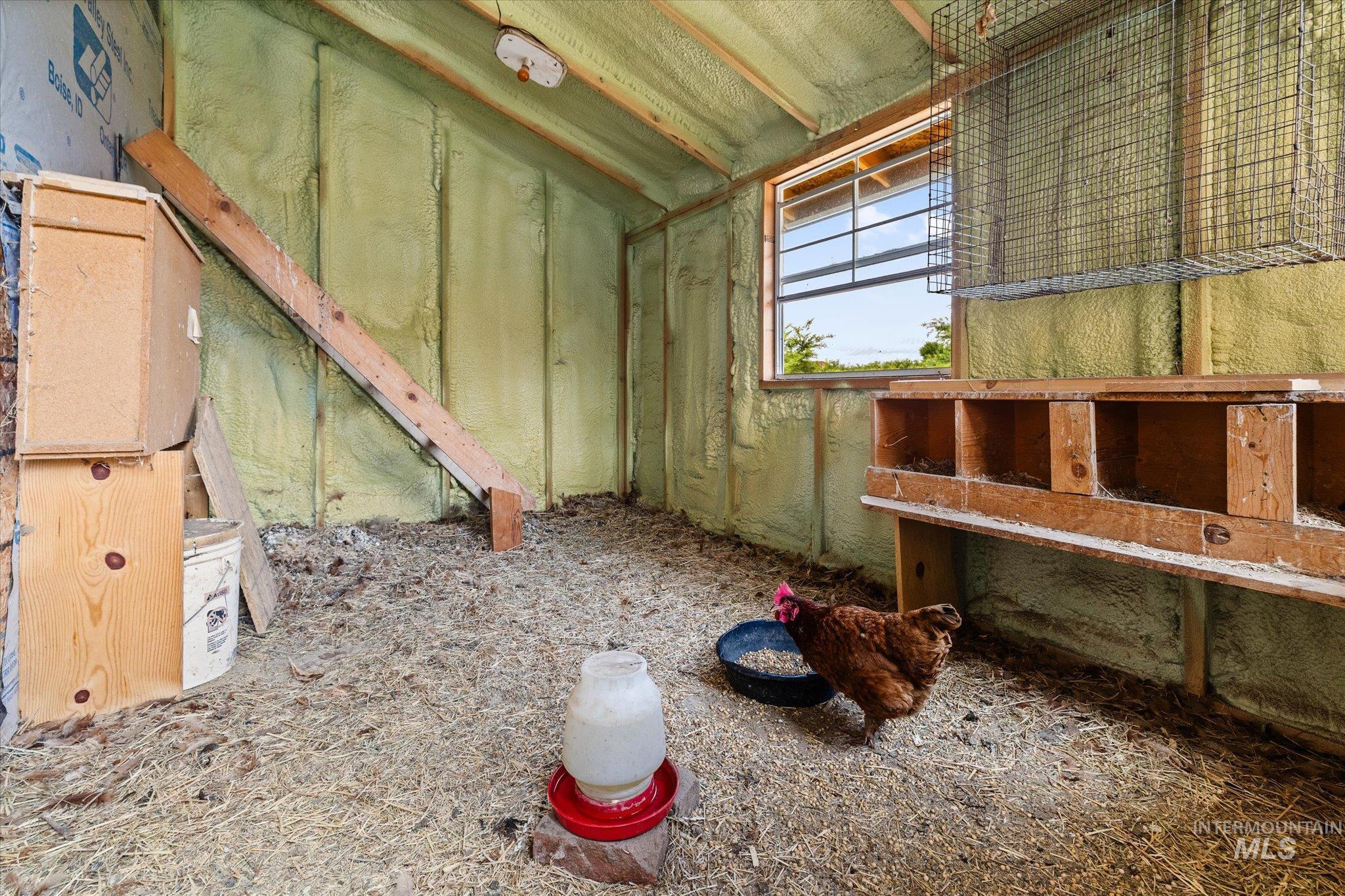 1140 Edgemont Road Emmett, ID 83617 - Photo 42 of 50 Interior structure featuring insulated walls, a framed window, and built-in wooden nesting boxes
