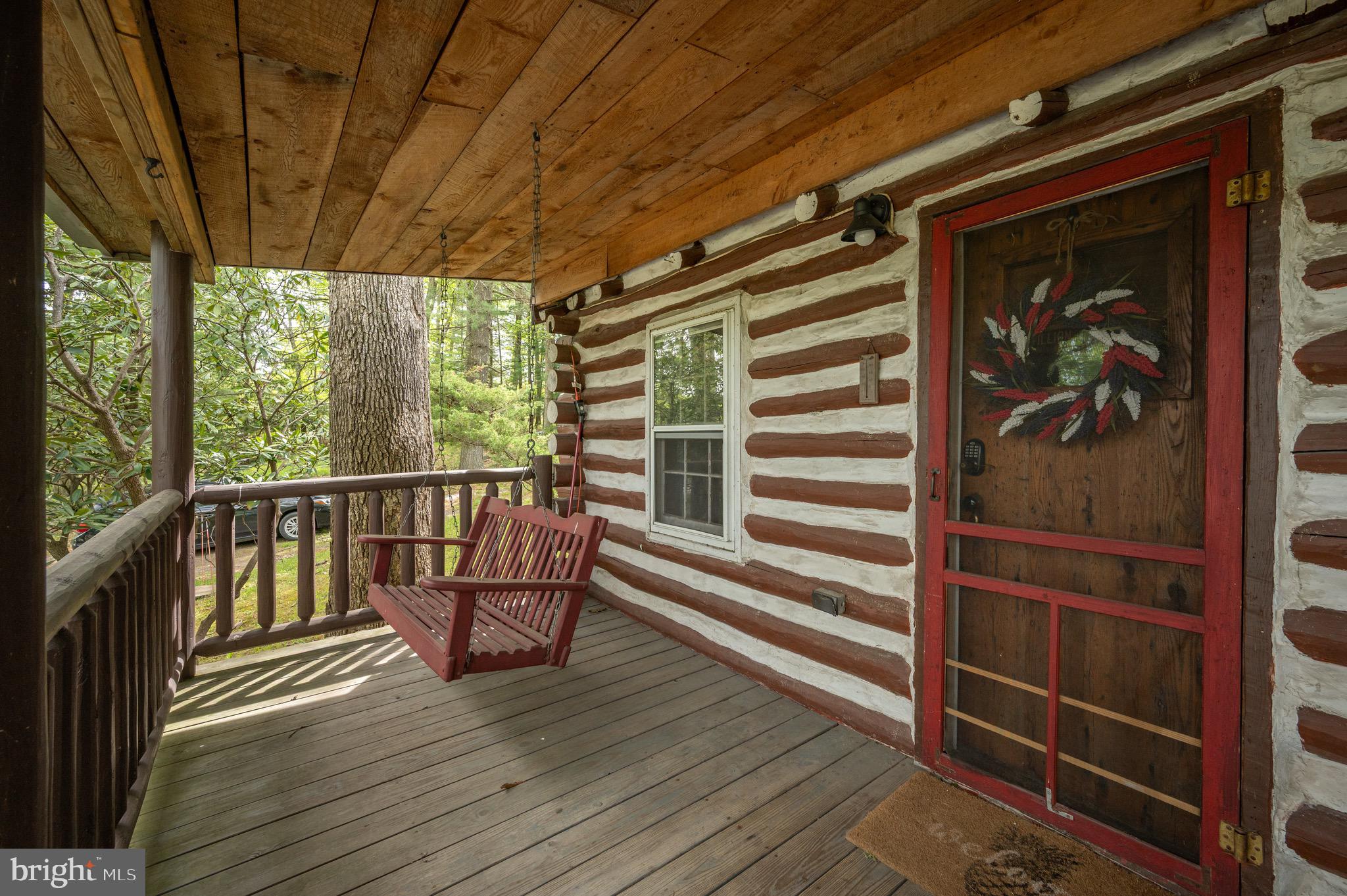 560 Glendale Road Oakland, MD 21550 - Photo 3 of 24 a view of balcony with wooden floor