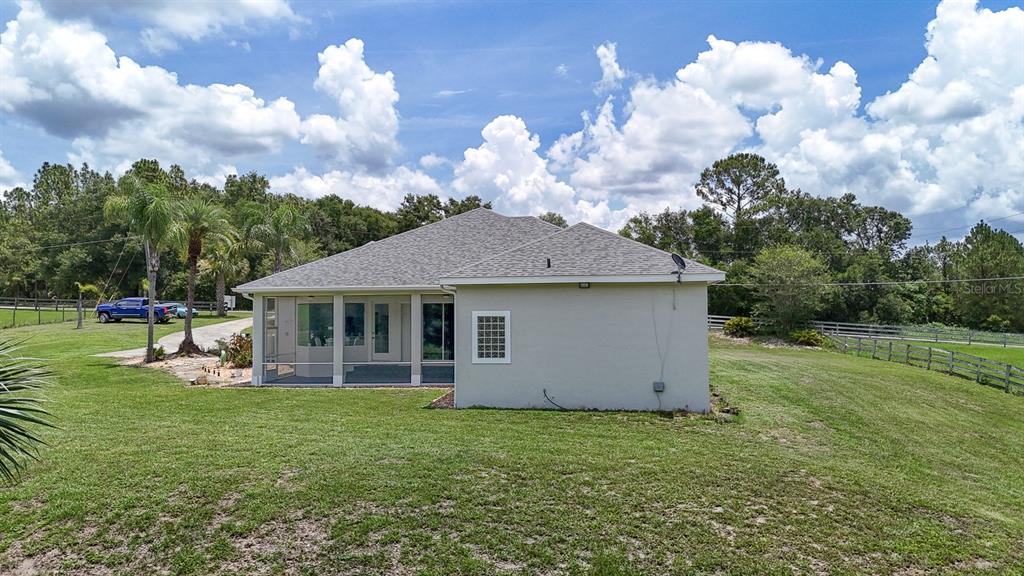 32025 Timberlake Drive Mount Dora, FL 32757 - Photo 2 of 55 a view of a house with backyard