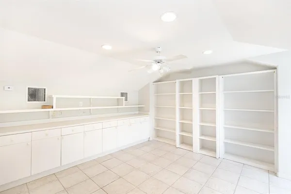 a view of an empty walk in closet