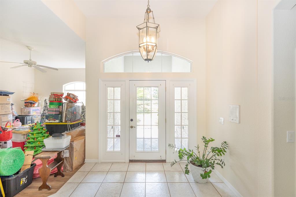 32025 Timberlake Drive Mount Dora, FL 32757 - Photo 31 of 55 a dining room with a table and chairs