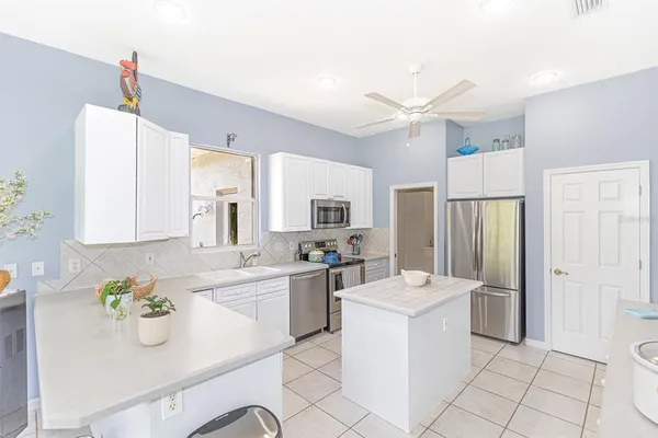 a view of storage and utility room with washer and dryer